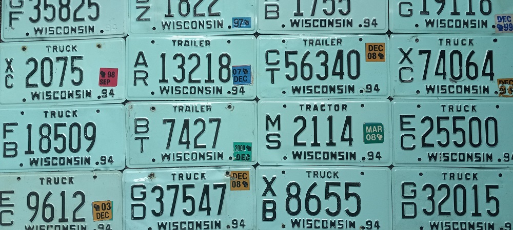 Group of light teal colored Wisconsin license plates