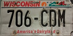Peeling Wisconsin Avery License Plate