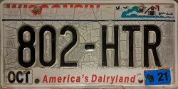 Faded Wisconsin Avery License Plate